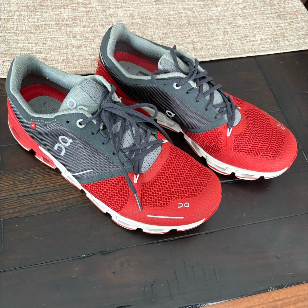 On Running Red and Gray Sneakers